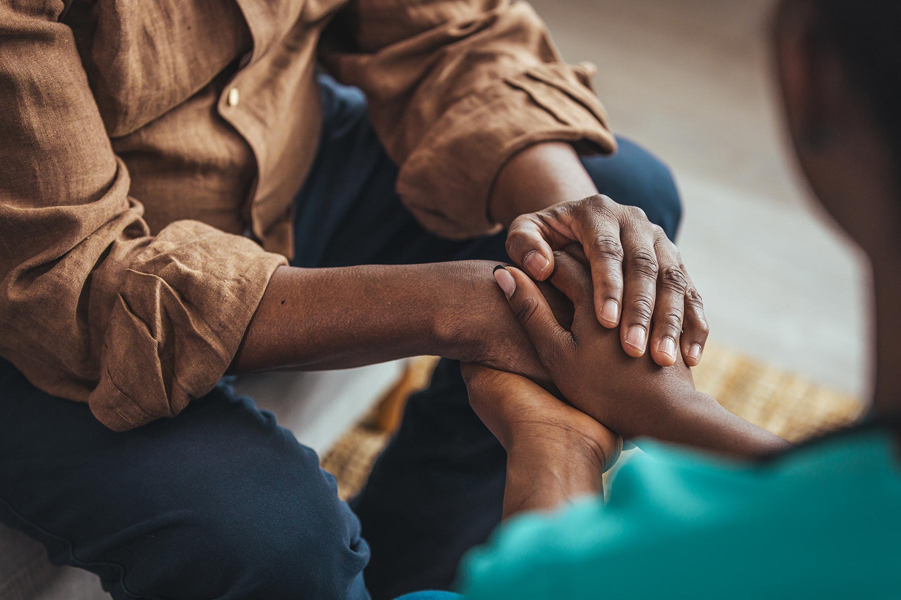 A Close-Up Of A Person Holding Hands